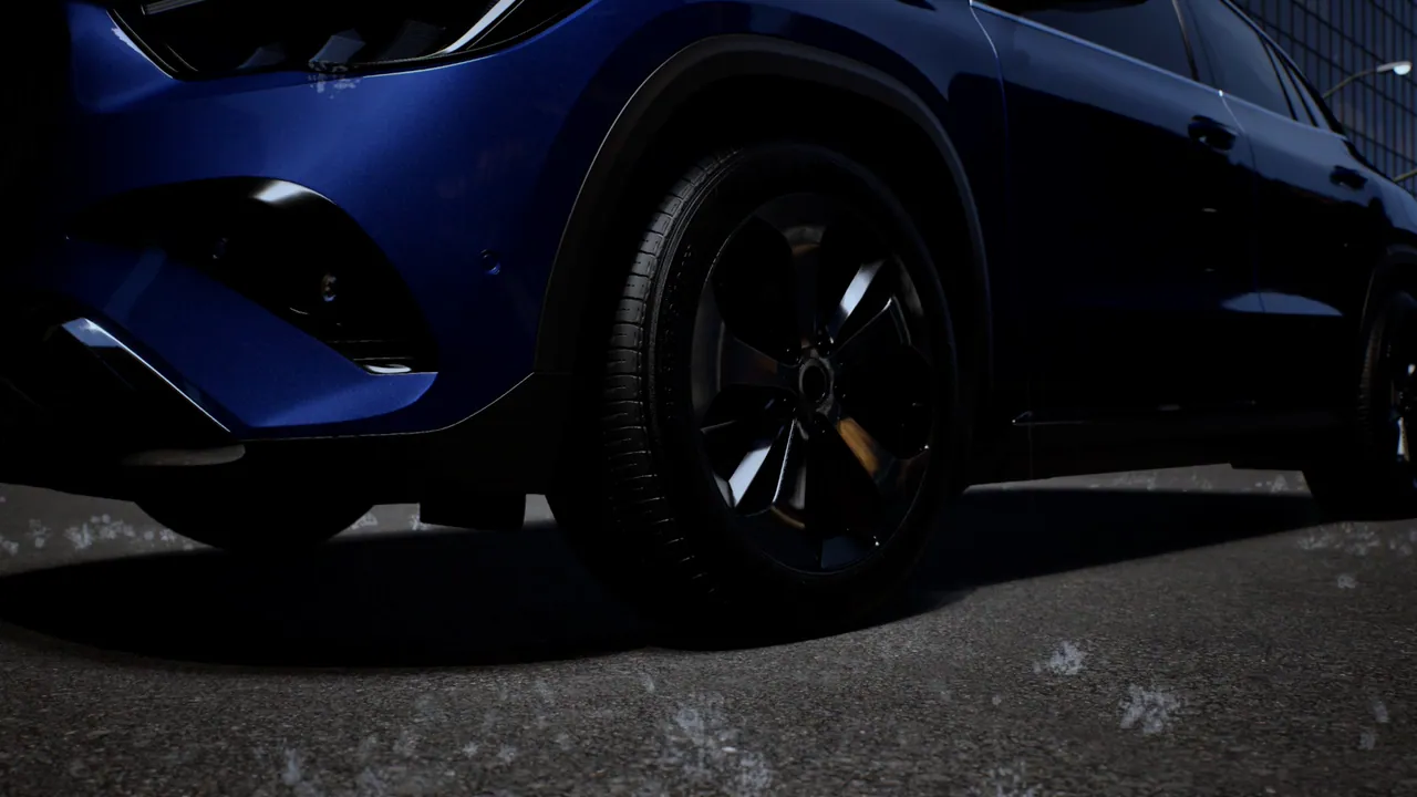 Low-angle CG view of the front wheel of a dark blue SUV on wet asphalt at night