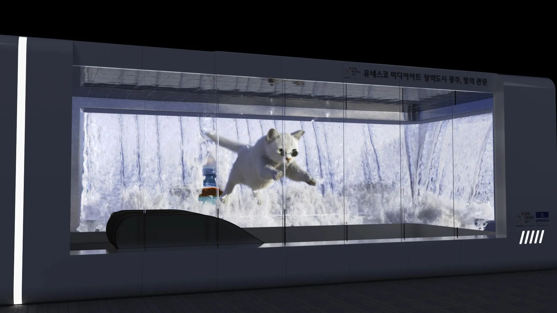 Wide night view of the "빛의 관문" (Gate of Light) media-wall installation, built as a recessed glass-tank opening in the building facade, with a CG white cat leaping through breaking water inside it